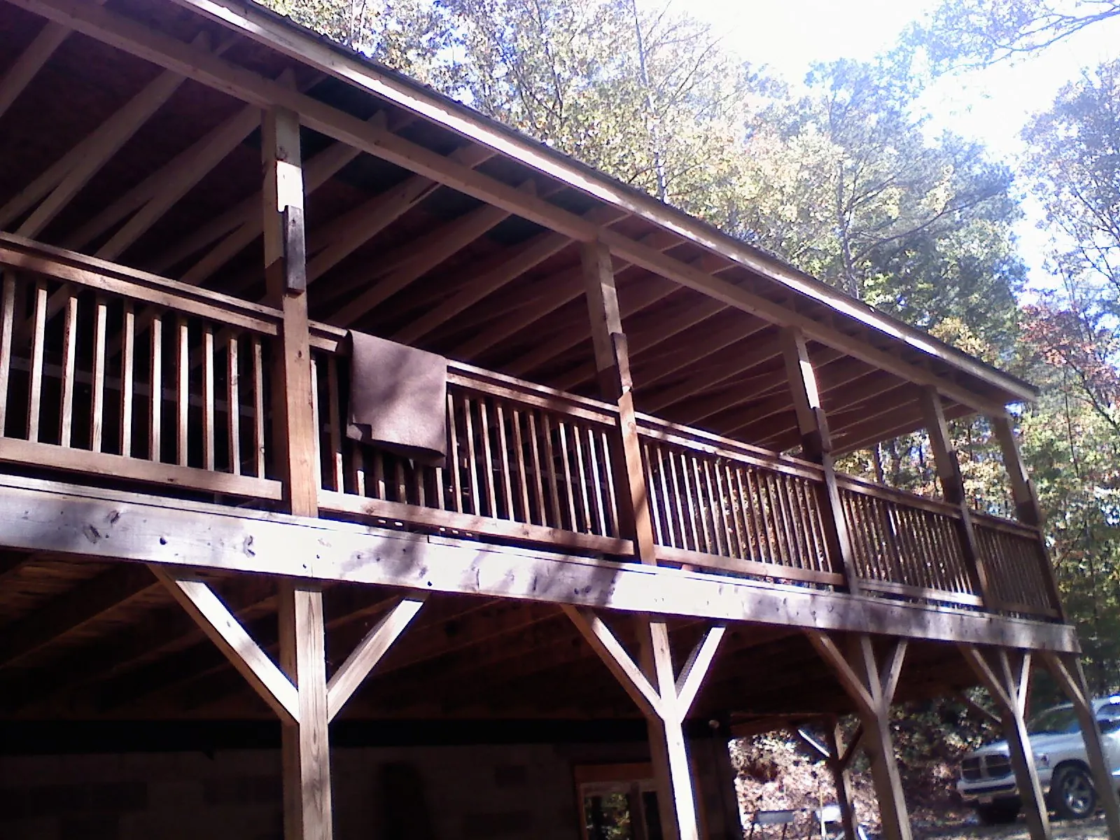 Timber framing under a new elevated porch and deck — Roof Leak Repair in Elk River by Roofing Brothers